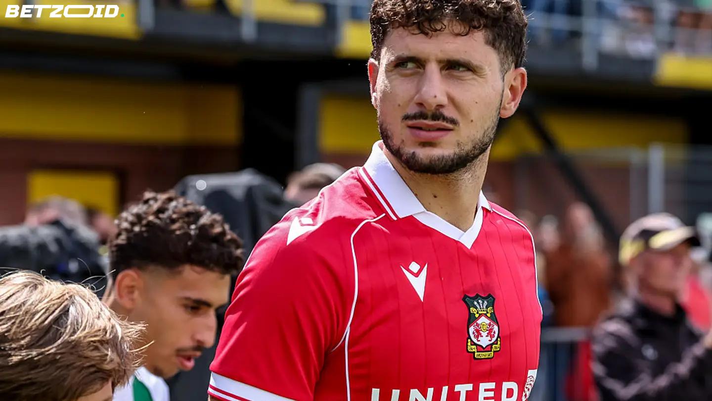 Cacace Pronto a Mantenere la Promessa al Wrexham Dopo l'Incubo Infortuni